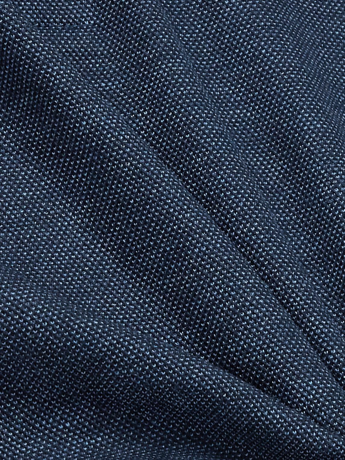 Vải cotton piqué là chất liệu độc quyền tạo nên thành công của Lacoste
